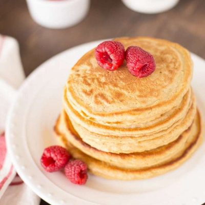 Light and fluffy whole wheat pancakes with raspberries!