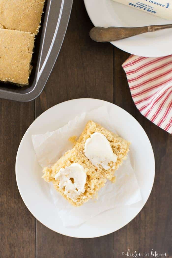 A healthier cornbread made with whole wheat flour and naturally sweetened with honey! It's soft and moist and full of cornbread flavor!