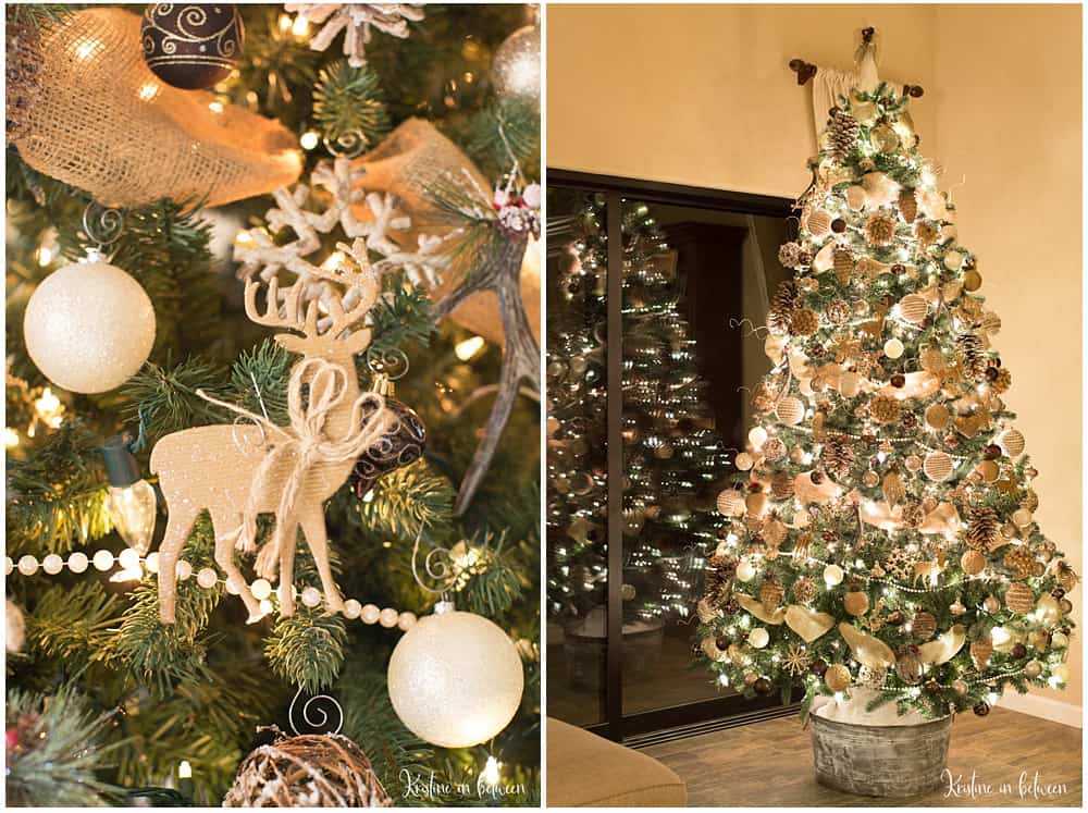 A decorated and lit Christmas tree with neutral colored ornaments.