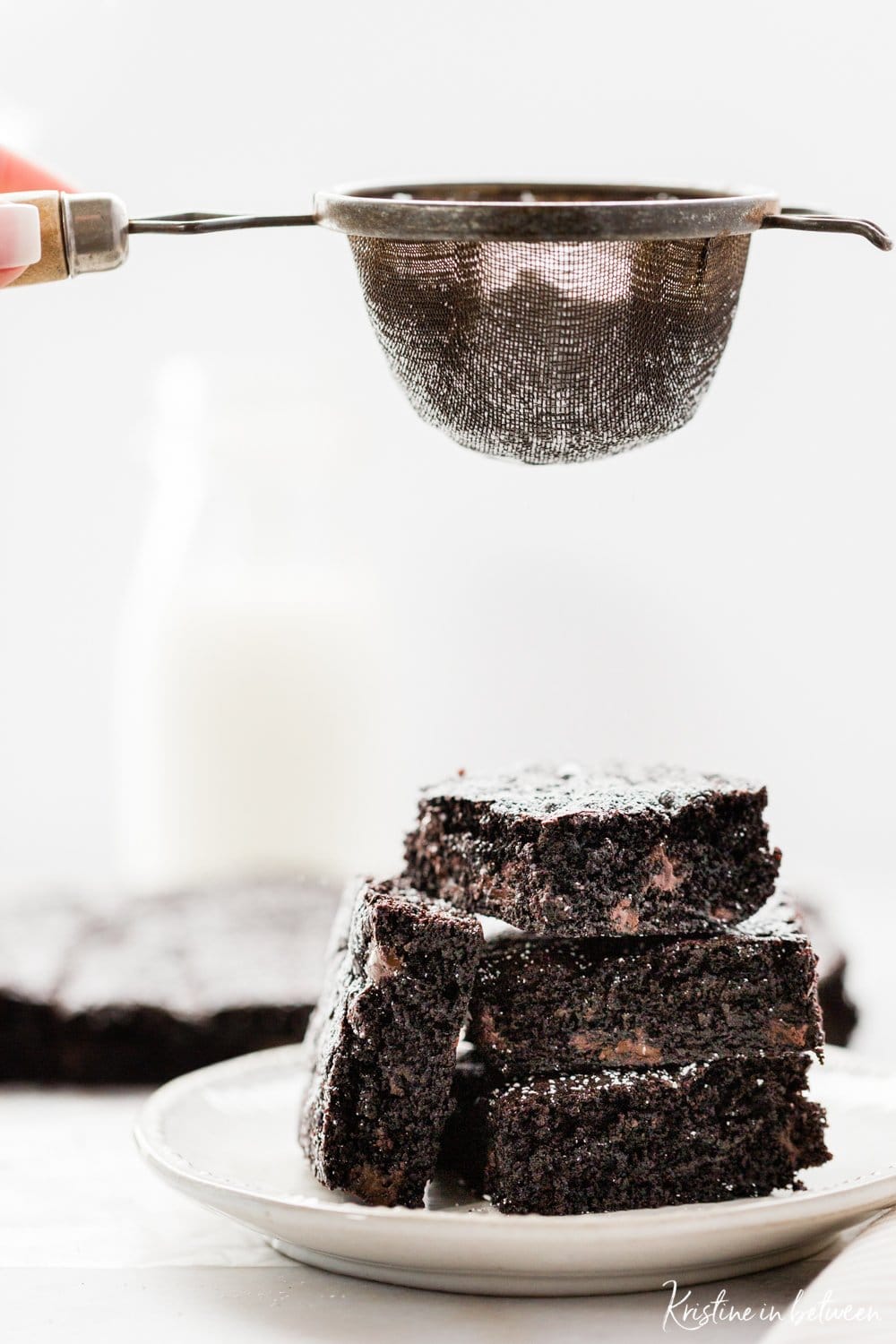 Super rich dark chocolate fudge brownies that are thick and chewy.