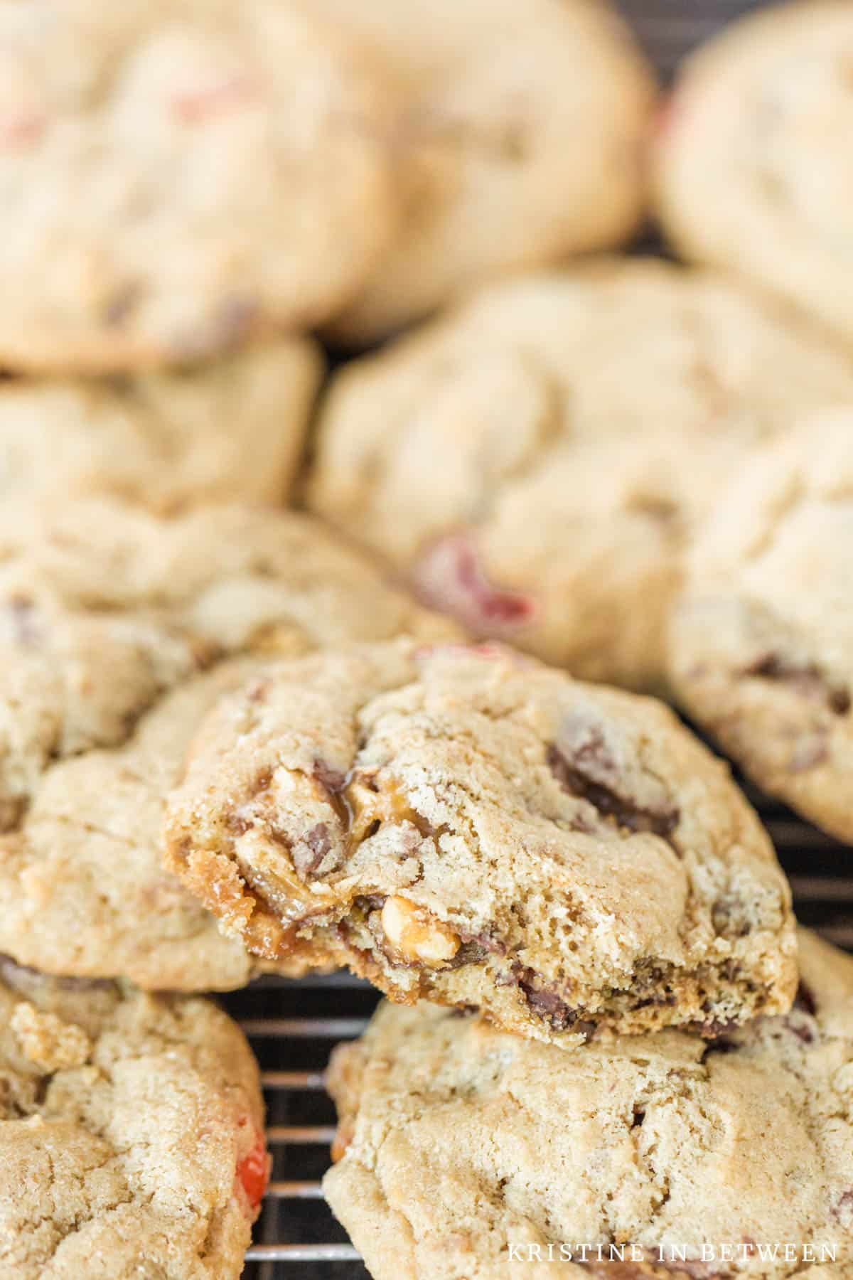 A cookie cut in half to show the candy on the inside.