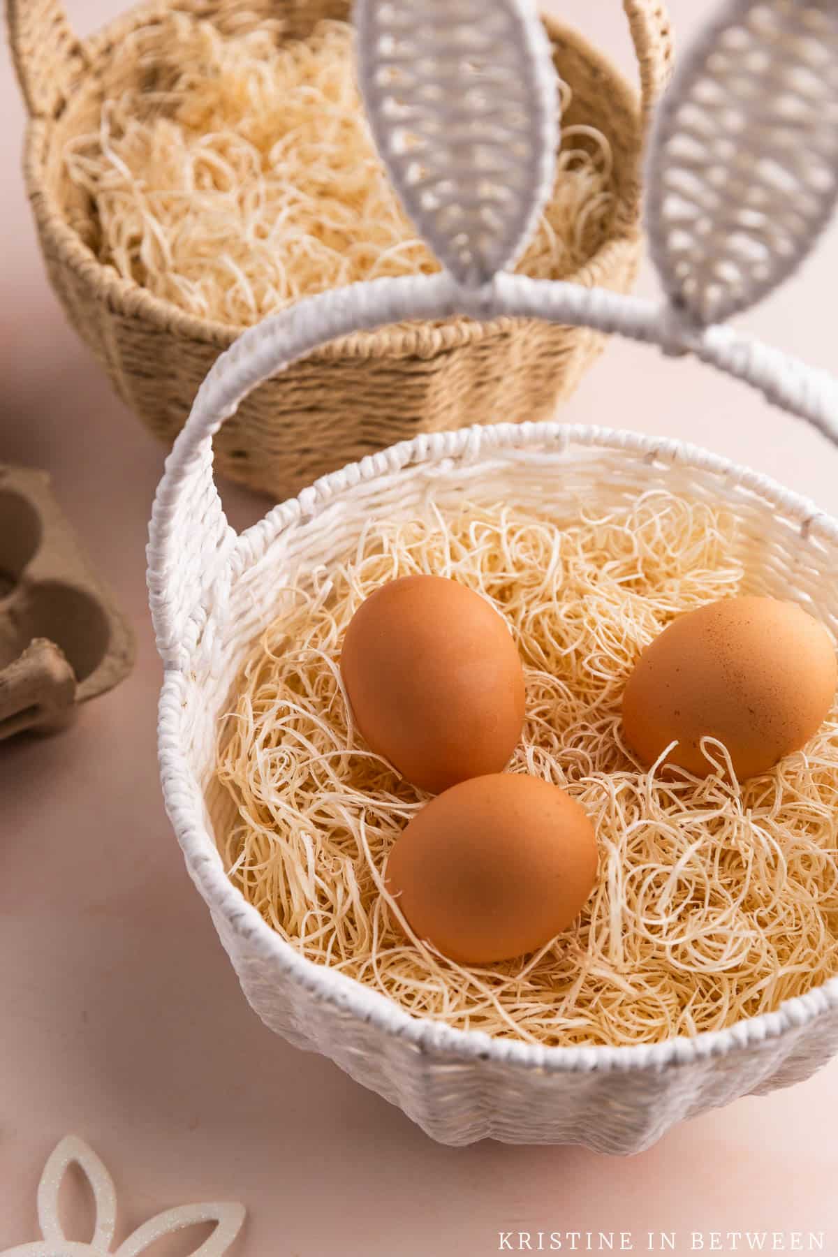 An easter basket with eggs inside.