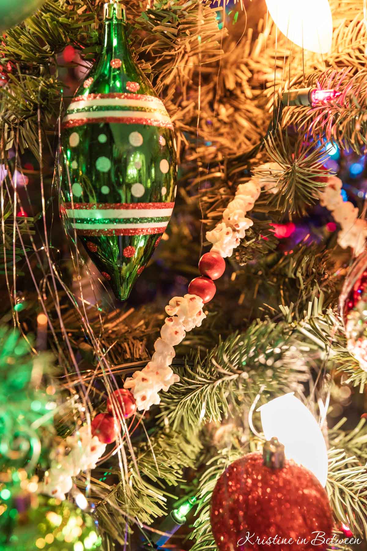 Popcorn garland on a traditional Christmas tree.